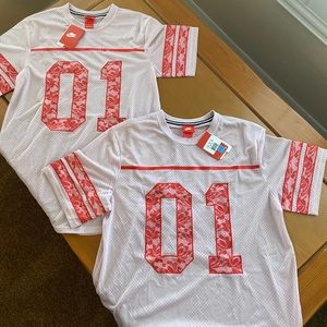 Two Nike unisex jerseys: size xl and med. NWT